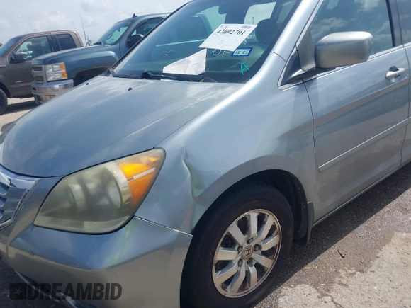 2010 Honda Odyssey EX with VIN 5FNRL3H42AB002679, listed as a IAAI auction lot 42692701 with 179,905 mi miles and . Bid and sale history available at DreamBid. Image 6.