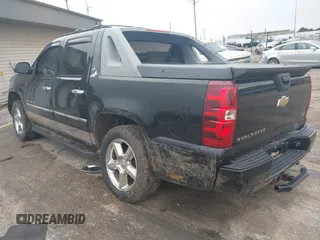 2011 Chevrolet Avalanche LTZ with VIN 3GNTKGE33BG111277, listed as a IAAI auction lot 42123375 with 209,024 mi miles. Bid and sale history available at carsss.com. Image 3.