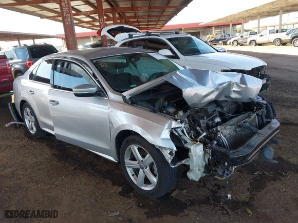 2014 Volkswagen Passat Wolfsburg Ed with VIN 1VWAT7A38EC051892, listed as a IAAI auction lot 41523058 with 122,493 mi miles. Bid and sale history available at carsss.com. Image 1.