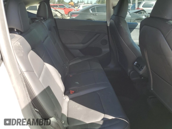 2023 Tesla Model Y Long Range z VIN 7SAYGDEE7PF788932, wystawiony jako Copart lot #52822515 z przebiegiem 33 007 mil mil oraz Szkoda całkowita • Salvage title. Historia ofert i sprzedaży dostępna na DreamBid. Obrazek 11.