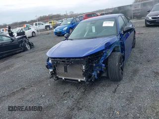 2022 Honda Civic Sport z VIN 2HGFE2F50NH503994, wystawiony jako IAAI lot #41870938 z przebiegiem 26 666 mil mil oraz . Historia ofert i sprzedaży dostępna na DreamBid. Obrazek 12.