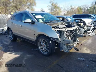 2015 Cadillac SRX Premium Collection with VIN 3GYFNDE35FS570576, listed as a IAAI auction lot 40922524 with 154,557 mi miles. Bid and sale history available at carsss.com. Image 1.