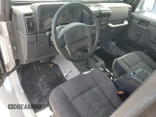 2004 Jeep Wrangler X with VIN 1J4FA39S94P747200, listed as a Copart auction lot 64617535 with 151,224 mi miles and Clean title. Bid and sale history available at DreamBid. Image 8.
