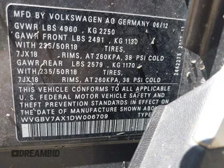 2013 Volkswagen Tiguan SE z VIN WVGBV7AX1DW006709, wystawiony jako IAAI lot #42388899 z przebiegiem 150 903 mil mil oraz . Historia ofert i sprzedaży dostępna na DreamBid. Obrazek 9.