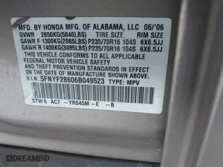 2006 Honda Pilot EX-L with RES with VIN 5FNYF28606B049523, listed as a IAAI auction lot 41736427 with 274,199 mi miles. Bid and sale history available at carsss.com. Image 9.
