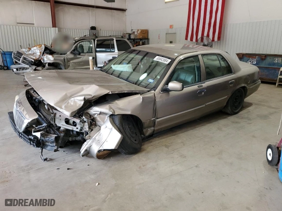 2003 Mercury Grand Marquis GS Convenience with VIN 2MEFM74W43X706057, listed as a Copart auction lot 65842884 with 215,829 mi miles and Salvage Title. Bid and sale history available at carsss.com. Image 1.