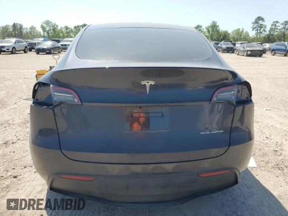 2024 Tesla Model Y Long Range with VIN 7SAYGDEE5RA282984, listed as a Copart auction lot 52388455 with 11,922 mi miles and Salvage Title. Bid and sale history available at DreamBid. Image 6.