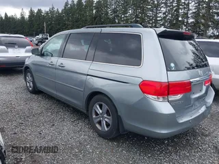 2008 Honda Odyssey Touring with VIN 5FNRL38908B098771, listed as a IAAI auction lot 41878646 with 167,834 mi miles. Bid and sale history available at carsss.com. Image 3.