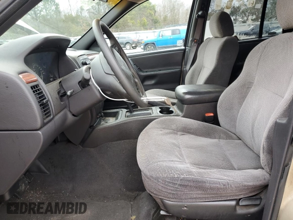 1999 Jeep Grand Cherokee Laredo с VIN 1J4G258S5XC795691, выставлен на аукционе Copart как лот 42556215 с пробегом 320 188 миль миль и Списание • Salvage title. История ставок и продаж доступна на DreamBid. Изображение 7.