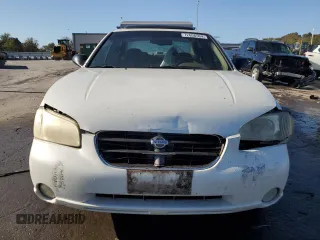 2001 Nissan Maxima SE 20th Anniversary. z VIN JN1CA31A81T313061, wystawiony jako Copart lot #72608504 z przebiegiem 200 484 mil mil oraz Szkoda całkowita • Salvage title. Historia ofert i sprzedaży dostępna na DreamBid. Obrazek 5.