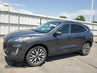 2020 Ford Escape Titanium with VIN 1FMCU9J98LUC51389, listed as a Copart auction lot 64387595 with 54,993 mi miles and Clean title. Bid and sale history available at DreamBid. Image 1.