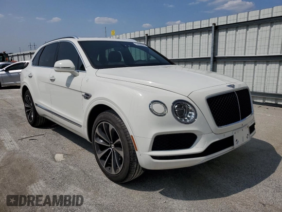 2019 Bentley Bentayga V8 z VIN SJAAM2ZV0KC026362, wystawiony jako Copart lot #54059393 z przebiegiem 31 530 mil mil oraz . Historia ofert i sprzedaży dostępna na DreamBid. Obrazek 4.