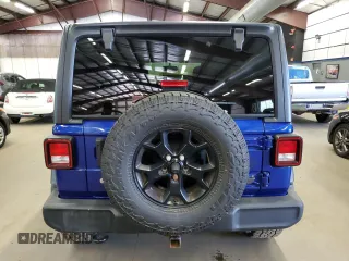 2020 Jeep Wrangler Unlimited Sport Altitude with VIN 1C4HJXDG3LW174064, listed as a Copart auction lot 63650625 with 209,226 mi miles and Clean title. Bid and sale history available at DreamBid. Image 6.