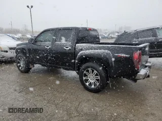 2011 GMC Canyon SLE1 with VIN 1GTH6MFE6B8141218, listed as a Copart auction lot 81897704 with 233,039 mi miles and Salvage Title. Bid and sale history available at carsss.com. Image 2.