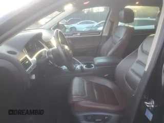 2013 Volkswagen Touareg Lux with VIN WVGEF9BP1DD001025, listed as a Copart auction lot 83784314 with 205,871 mi miles and Salvage Title. Bid and sale history available at DreamBid. Image 7.