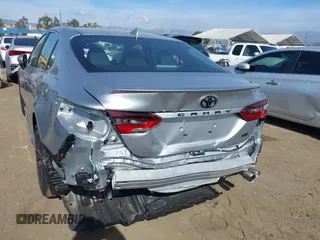 2023 Toyota Camry SE z VIN 4T1T11AK0PU153203, wystawiony jako IAAI lot #38763517 z przebiegiem 11 171 mil mil oraz . Historia ofert i sprzedaży dostępna na DreamBid. Obrazek 6.