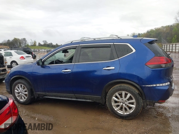 2019 Nissan Rogue SV with VIN 5N1AT2MT7KC829981, listed as a IAAI auction lot 41909889 with 57,794 mi miles and . Bid and sale history available at DreamBid. Image 14.