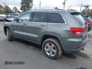 2012 Jeep Grand Cherokee Laredo with VIN 1C4RJFAG8CC298268, listed as a IAAI auction lot 40787833 with 206,486 mi miles. Bid and sale history available at carsss.com. Image 3.