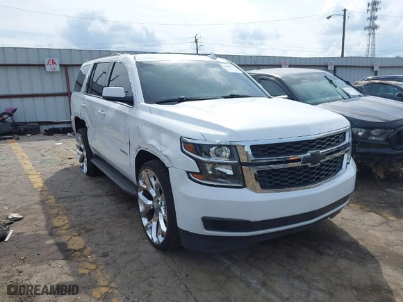 2019 Chevrolet Tahoe LT with VIN 1GNSCBKC6KR345154, listed as a IAAI auction lot 41808536 with 124,325 mi miles. Bid and sale history available at carsss.com. Image 1.