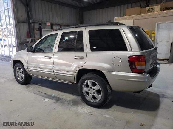 2003 Jeep Grand Cherokee Limited with VIN 1J4GW58NX3C572555, listed as a Copart auction lot 80675454 with 174,894 mi miles and Salvage Title. Bid and sale history available at carsss.com. Image 2.