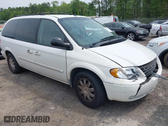 2006 Chrysler Town & Country Touring with VIN 2A4GP54L46R859144, listed as a IAAI auction lot 42037427 with 265,354 mi miles and . Bid and sale history available at DreamBid. Image 1.