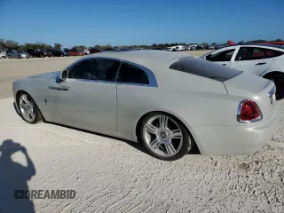 2015 Rolls-Royce Wraith z VIN SCA665C52FUX85269, wystawiony jako Copart lot #77326374 z przebiegiem Nie podano mil oraz Szkody całkowita. Historia ofert i sprzedaży dostępna na DreamBid. Obrazek 2.