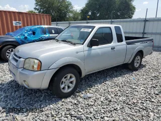 2001 Nissan Frontier XE z VIN 1N6DD26S91C324409, wystawiony jako Copart lot #55897595 z przebiegiem 136 314 mil mil oraz Szkoda całkowita • Salvage title. Historia ofert i sprzedaży dostępna na DreamBid. Obrazek 1.