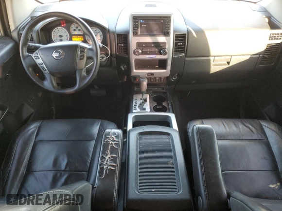 2013 Nissan Titan SV with VIN 1N6BA0EC3DN310724, listed as a Copart auction lot 84192004 with 165,959 mi miles and Salvage title. Bid and sale history available at DreamBid. Image 8.