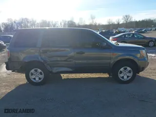 2007 Honda Pilot LX with VIN 2HKYF18197H504905, listed as a IAAI auction lot 41293667 with 200,448 mi miles. Bid and sale history available at carsss.com. Image 13.