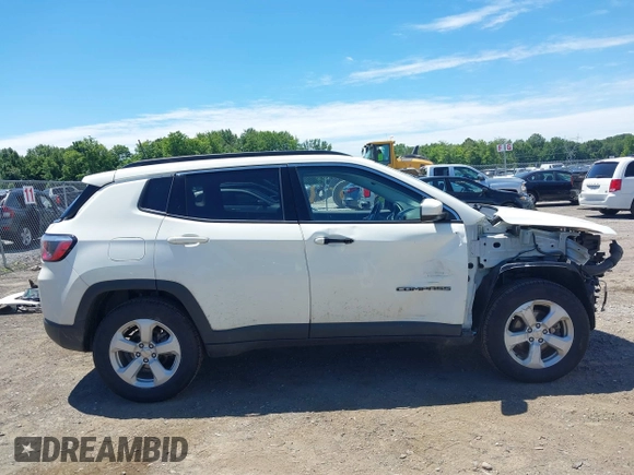 2020 Jeep Compass Latitude with VIN 3C4NJDBBXLT219466, listed as a IAAI auction lot 39766901 with 147,492 mi miles and . Bid and sale history available at DreamBid. Image 14.