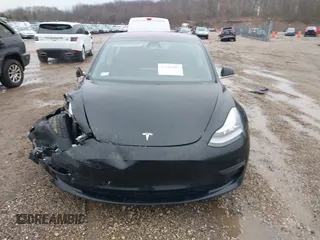 2018 Tesla Model 3 Long Range Battery with VIN 5YJ3E1EB1JF127289, listed as a IAAI auction lot 41484253 with 60,577 mi miles and . Bid and sale history available at DreamBid. Image 12.