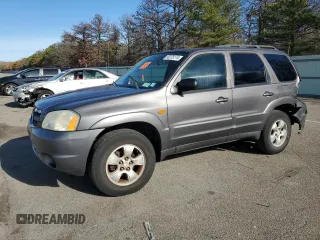 2003 Mazda Tribute LX with VIN 4F2YZ94183KM55266, listed as a Copart auction lot 80276174 with 154,358 mi miles and Salvage Title. Bid and sale history available at carsss.com. Image 1.