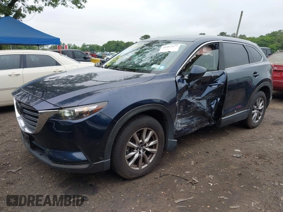 2019 Mazda CX-9 Touring with VIN JM3TCBCY6K0334898, listed as a IAAI auction lot 42467677 with 69,454 mi miles and . Bid and sale history available at DreamBid. Image 18.