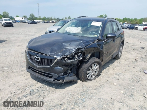 2014 Mazda CX-5 Sport with VIN JM3KE2BE3E0405976, listed as a IAAI auction lot 42161069 with 66,301 mi miles and . Bid and sale history available at carsss.com. Image 17.