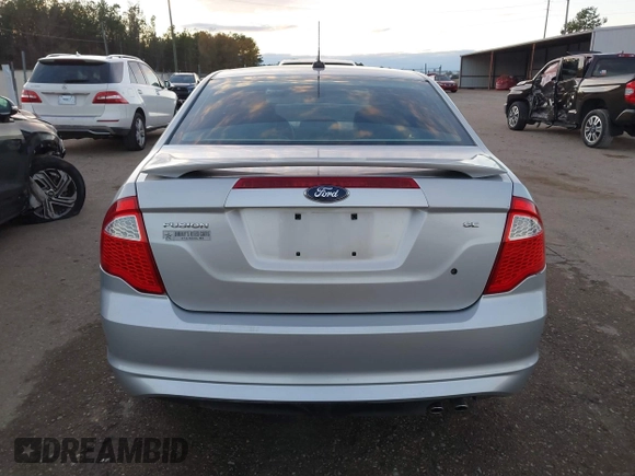 2012 Ford Fusion SE z VIN 3FAHP0HA4CR213409, wystawiony jako IAAI lot #41079155 z przebiegiem 139 129 mil mil oraz . Historia ofert i sprzedaży dostępna na DreamBid. Obrazek 15.