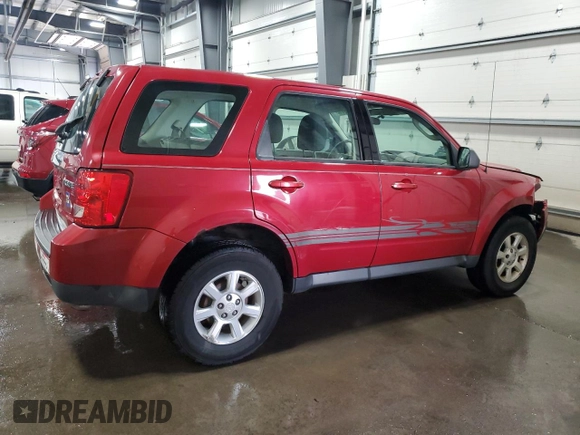 2011 Mazda Tribute Touring with VIN 4F2CY0C71BKM06780, listed as a Copart auction lot 77748114 with 144,163 mi miles and Salvage Title. Bid and sale history available at carsss.com. Image 3.