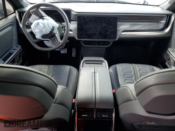 2023 Rivian R1T Adventure with VIN 7FCTGBAA2PN028983, listed as a Copart auction lot 45307015 with 220 mi miles and Salvage Title. Bid and sale history available at DreamBid. Image 8.
