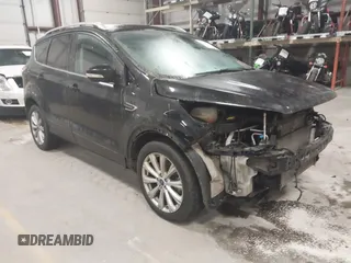 2017 Ford Escape Titanium with VIN 1FMCU9J9XHUB51401, listed as a IAAI auction lot 41025642 with 77,908 mi miles. Bid and sale history available at carsss.com. Image 1.