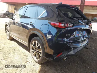 2023 Mazda CX-5 2.5 S Premium Plus Package with VIN JM3KFBEM3P0125736, listed as a IAAI auction lot 41578619 with 18,560 mi miles. Bid and sale history available at carsss.com. Image 3.