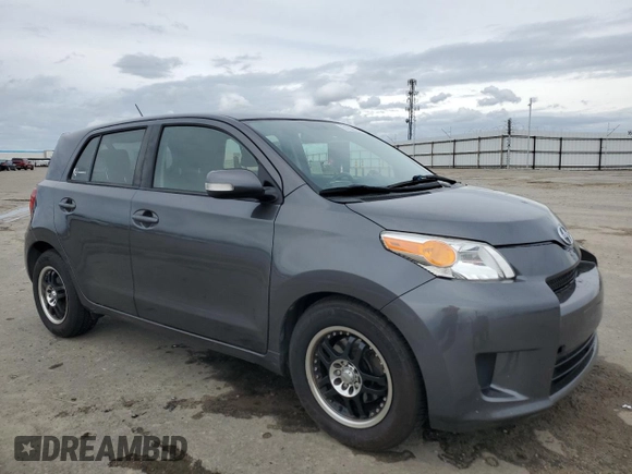 2008 Scion xD with VIN JTKKU10448J031272, listed as a Copart auction lot 51302185 with 121,055 mi miles and Salvage Title. Bid and sale history available at carsss.com. Image 4.