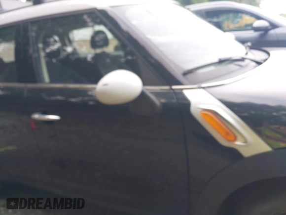 2012 MINI Countryman with VIN WMWZB3C5XCWM30191, listed as a IAAI auction lot 42435291 with 103,254 mi miles and . Bid and sale history available at DreamBid. Image 14.