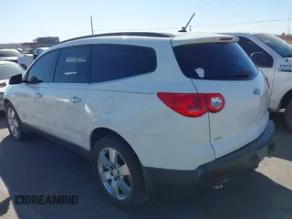 2011 Chevrolet Traverse LTZ with VIN 1GNKVLED4BJ369150, listed as a IAAI auction lot 41733465 with 168,655 mi miles and . Bid and sale history available at DreamBid. Image 3.