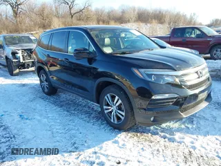 2016 Honda Pilot EX-L with VIN 5FNYF6H7XGB115951, listed as a IAAI auction lot 41642756 with 101,688 mi miles. Bid and sale history available at carsss.com. Image 1.
