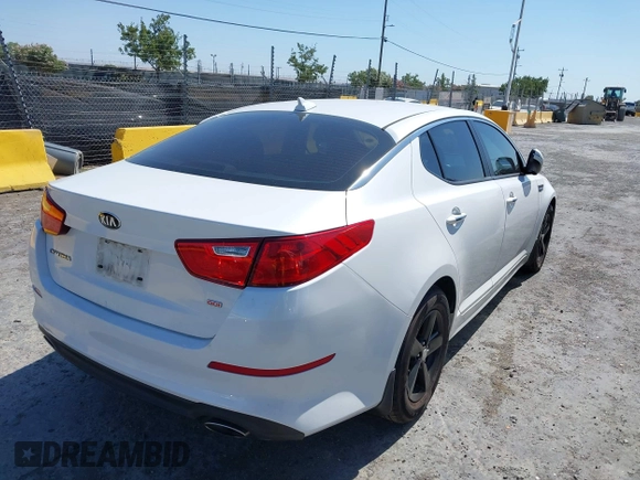 2015 Kia Optima LX z VIN KNAGM4A7XF5528918, wystawiony jako IAAI lot #42673801 z przebiegiem 132 968 mil mil oraz . Historia ofert i sprzedaży dostępna na DreamBid. Obrazek 4.