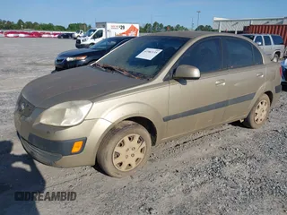 2007 Kia Rio LX with VIN KNADE123176203130, listed as a IAAI auction lot 41982135 with 221,702 mi miles. Bid and sale history available at carsss.com. Image 2.