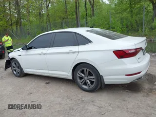 2021 Volkswagen Jetta S z VIN 3VWC57BU6MM020180, wystawiony jako IAAI lot #42263574 z przebiegiem 68 384 mil mil oraz . Historia ofert i sprzedaży dostępna na DreamBid. Obrazek 14.