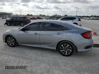 2016 Honda Civic EX with VIN 19XFC2F74GE059765, listed as a Copart auction lot 45555735 with 48,643 mi miles and Salvage Title. Bid and sale history available at DreamBid. Image 2.