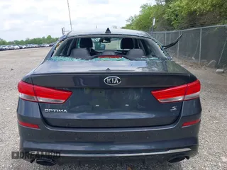 2019 Kia Optima LX z VIN 5XXGT4L32KG298796, wystawiony jako IAAI lot #42266827 z przebiegiem 89 841 mil mil oraz . Historia ofert i sprzedaży dostępna na DreamBid. Obrazek 16.