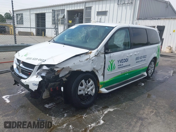 2014 Dodge Grand Caravan American Value with VIN 2C4RDGBG6ER380568, listed as a IAAI auction lot 41683180 with 303,612 mi miles and . Bid and sale history available at DreamBid. Image 17.