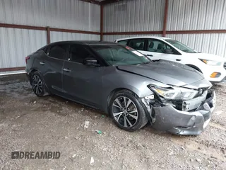 2018 Nissan Maxima Platinum z VIN 1N4AA6AP4JC390235, wystawiony jako IAAI lot #42376364 z przebiegiem 152 293 mil mil oraz . Historia ofert i sprzedaży dostępna na DreamBid. Obrazek 1.